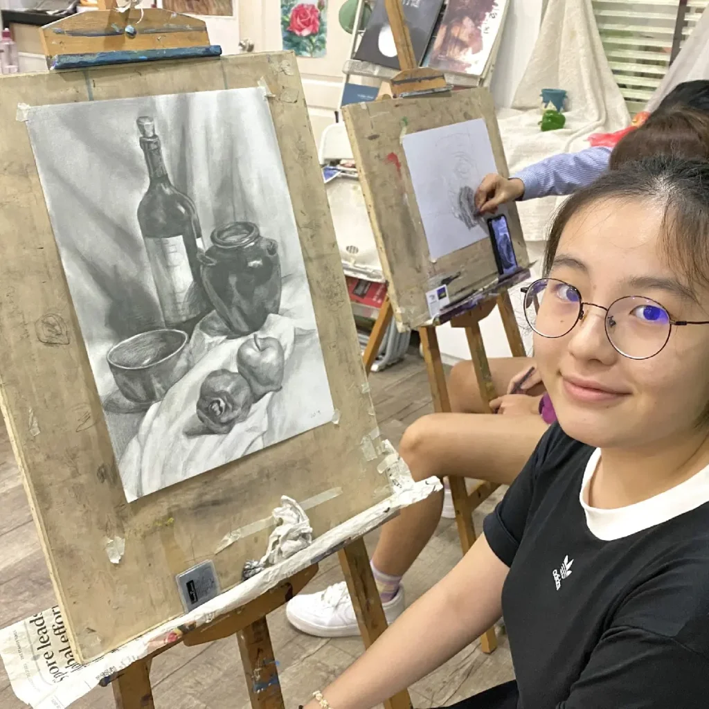 Teenagers creating art during an 8-session holiday art immersion course at Visual Arts Centre