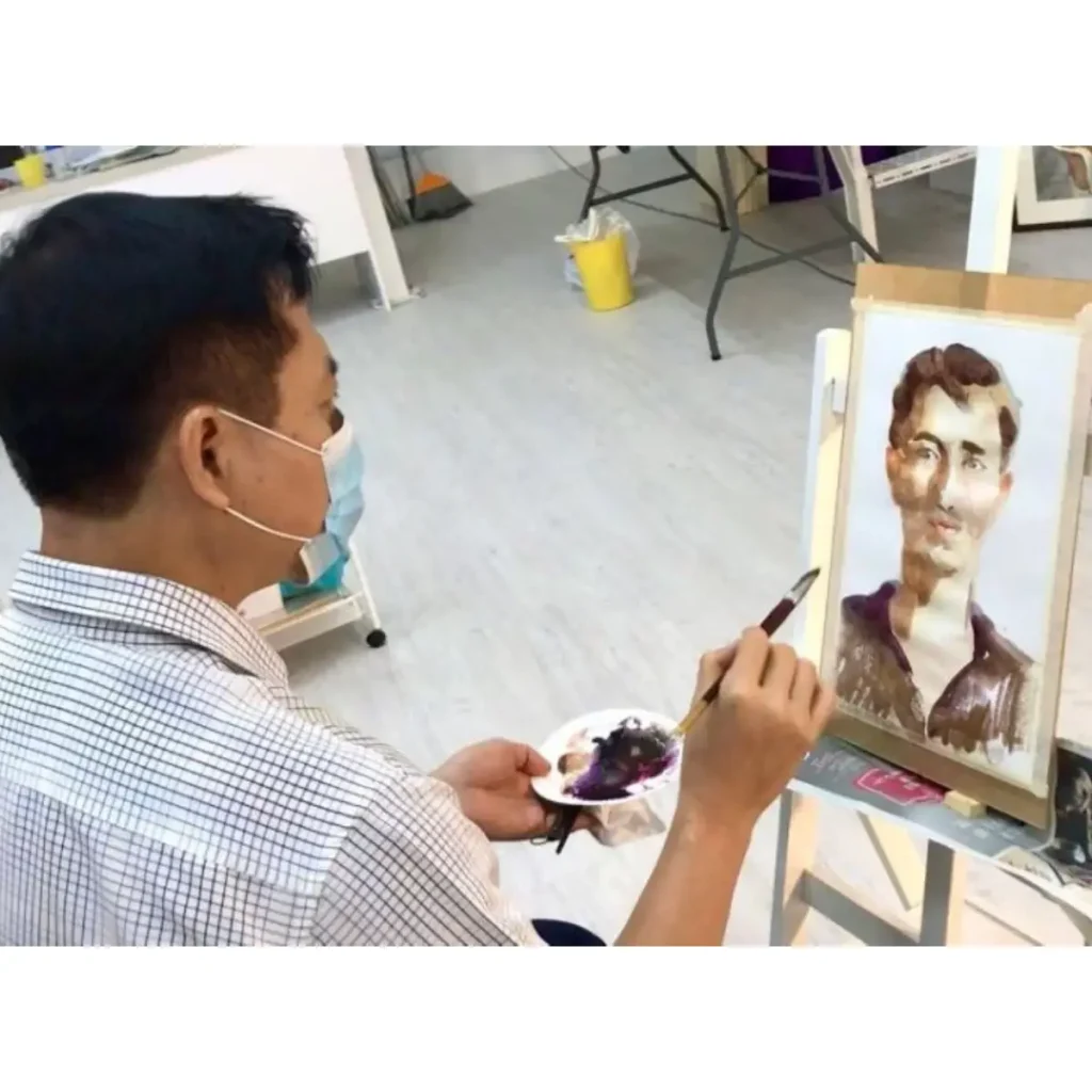 Students drawing and painting in a professional art immersion class across 24 sessions