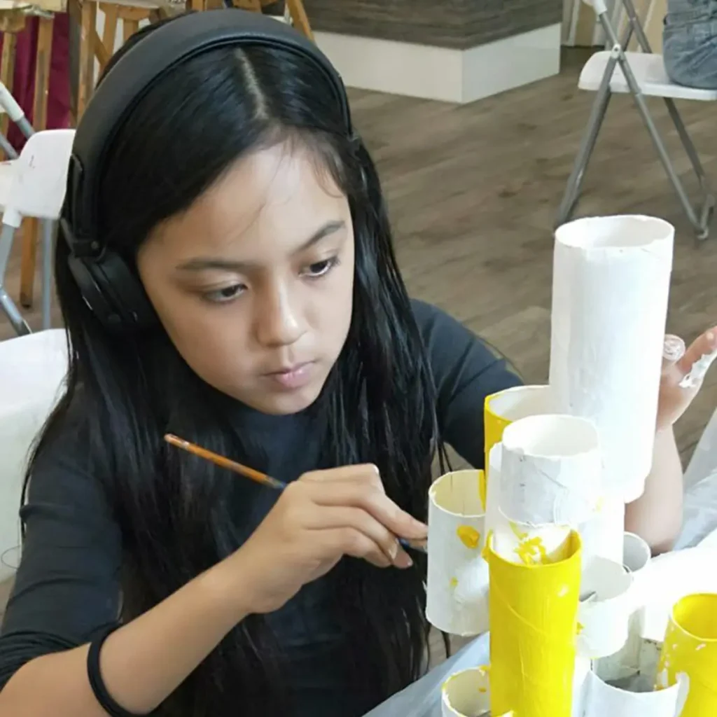 Expressive portrait artwork in warm tones, representing creativity explored in the Holiday Bootcamp