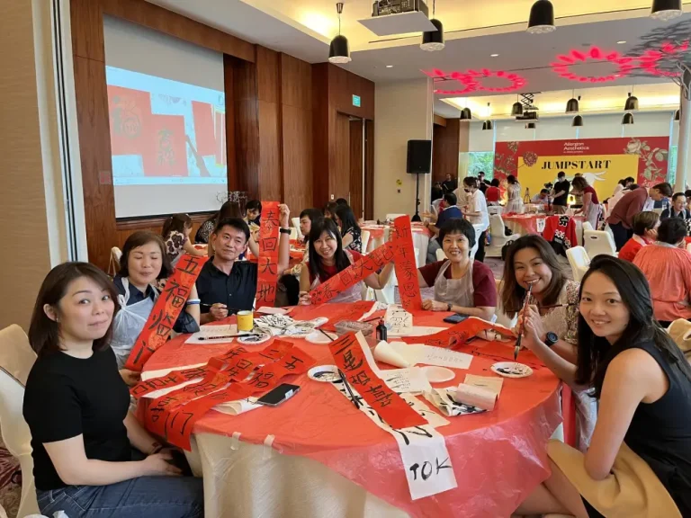 Allergan Chinese calligraphy couplet writing team bonding art jamming group photo. 为贵宾晚宴创作的艺术作品