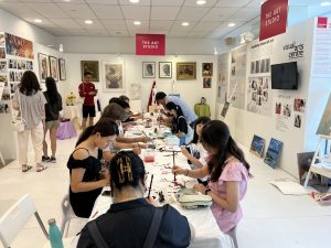 Visual Arts Centre Students are freely creating Chinese Ink based on the theme “梅花” during Affordable Art Fair Singapore