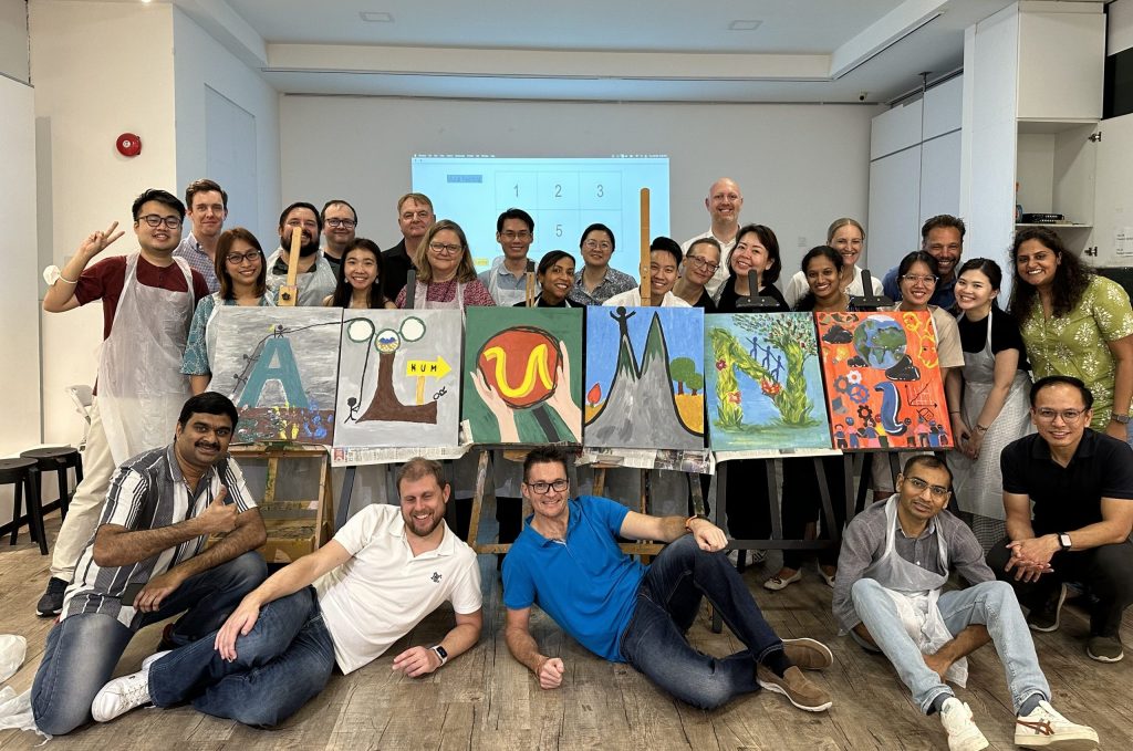 A) 2023, Alumni, mural acrylic painting final group photo team bonding art jamming