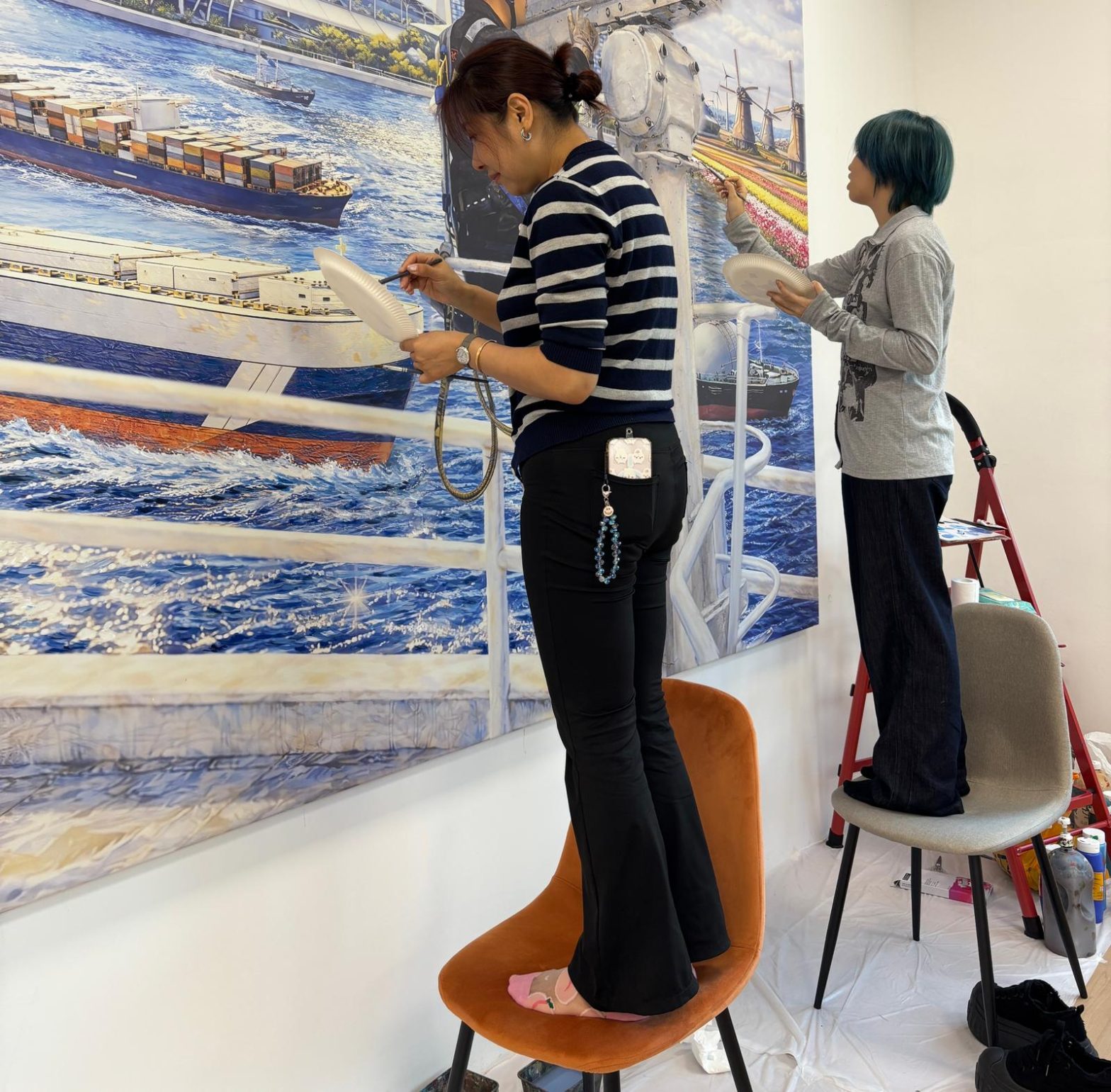 Custom made company mural Visual Arts Centre.jpeg installing setup