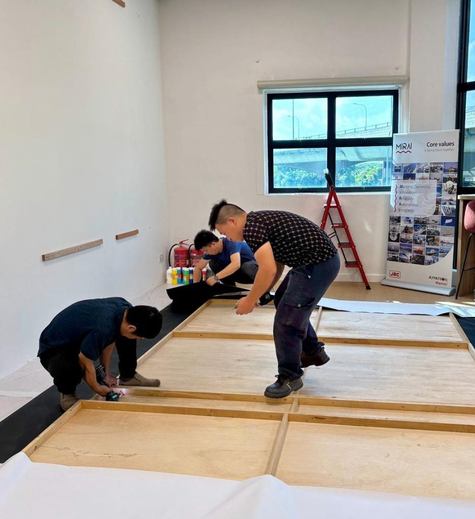 Custom made company mural Visual Arts Centre.jpeg installation