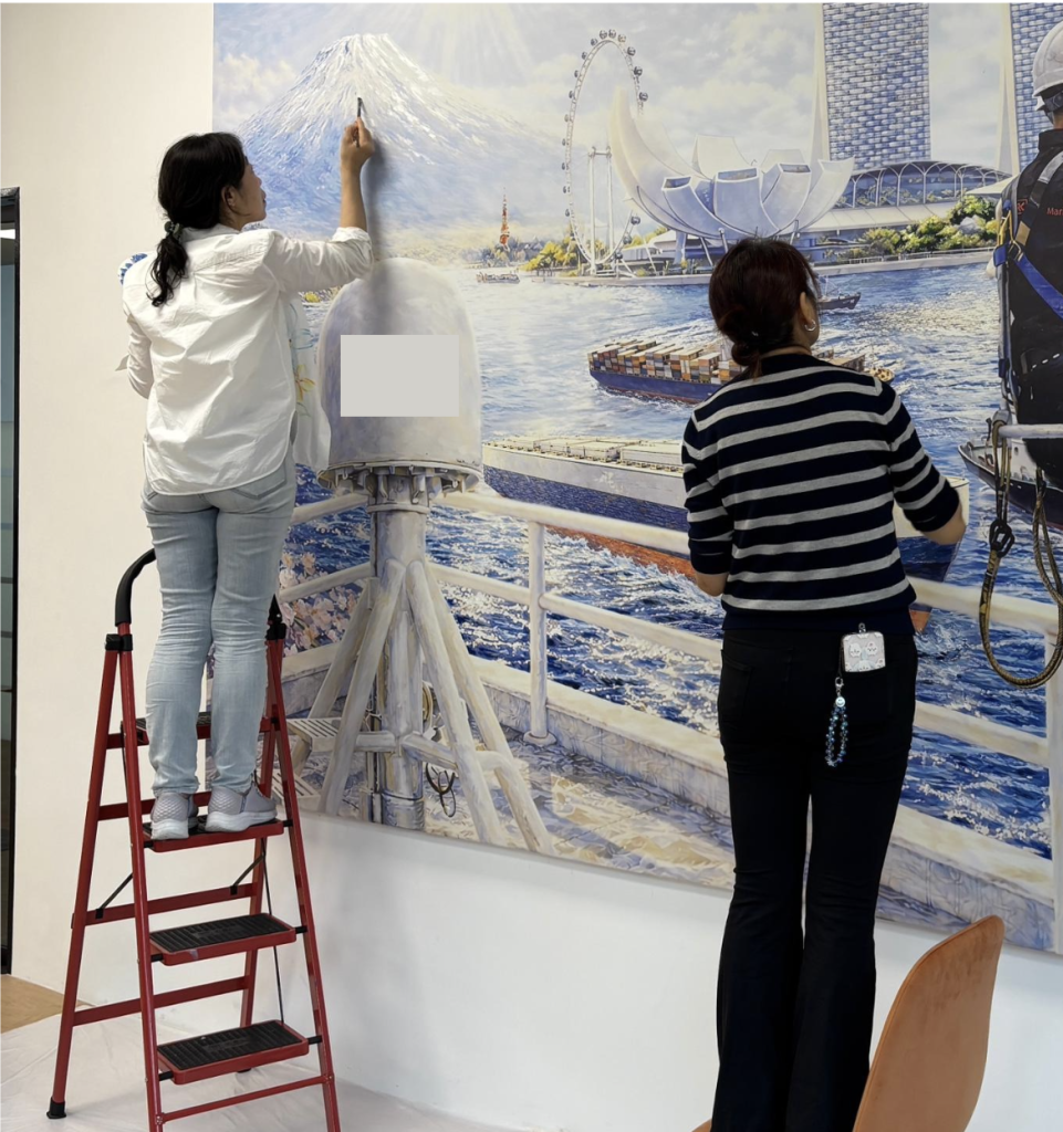 Custom made company mural Visual Arts Centre.jpeg installing setup