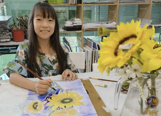 Student doing still life watercolour painting