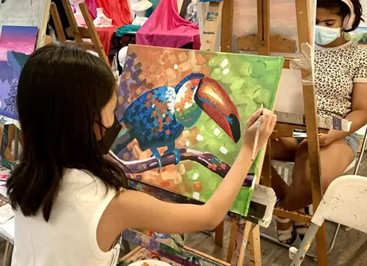 Visual Arts Centre Student doing animal acrylic painting