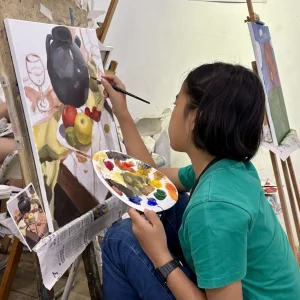 Children learning professional acrylic painting at Visual Arts Centre Singapore