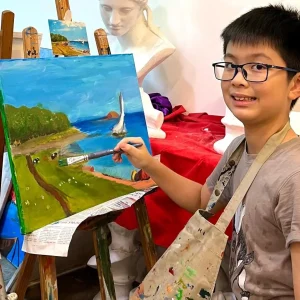 Children learning acrylic painting in a professional art class at Visual Arts Centre Singapore